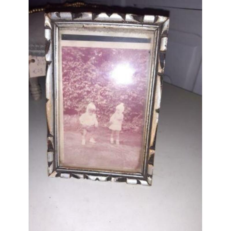 Vintage houten fotolijstje bewerkte rand met oude foto kinde