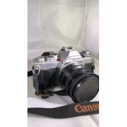 Vintage AV-1 Canon camera met strap en lens protector K
