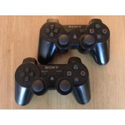 PlayStation 3 met 2 controllers en 4 games